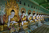 Myanmar - Sagaing hill, Umin Thounzeh (the 30 Caves), a colourful crescent-shaped colonnade within which there are 45 Buddha images. 